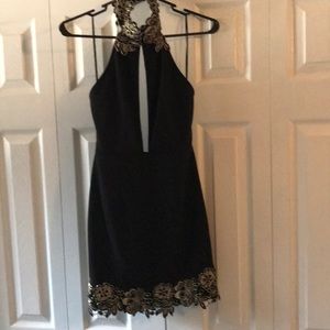 Black dress with gold flower detailing